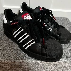 Adidas black Superstar shoes
